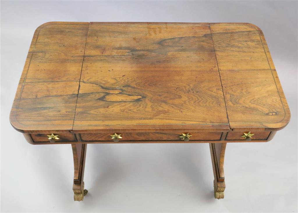 A Regency brass strung rosewood games table, W.3ft D.1ft 9in. H.2ft 5in.